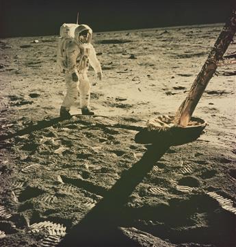 (APOLLO 11 MOON LANDING) Presentation album with 20 iconic photographs depicting the Apollo 11 Mission, featuring breathtaking views of